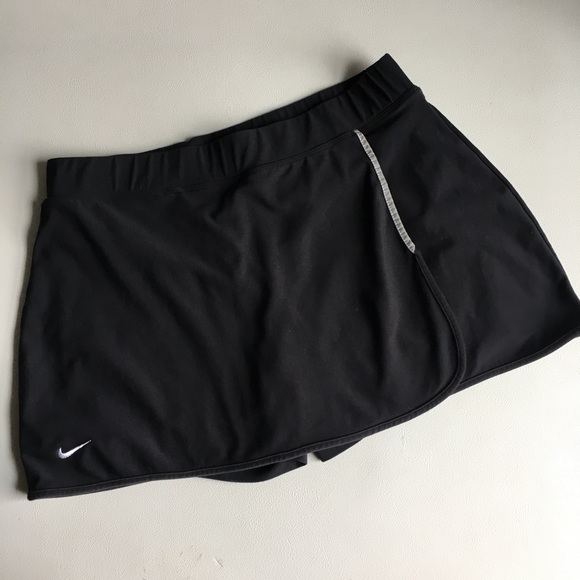 Nike Dresses & Skirts - Nike reflective fit dry workout tennis skirt